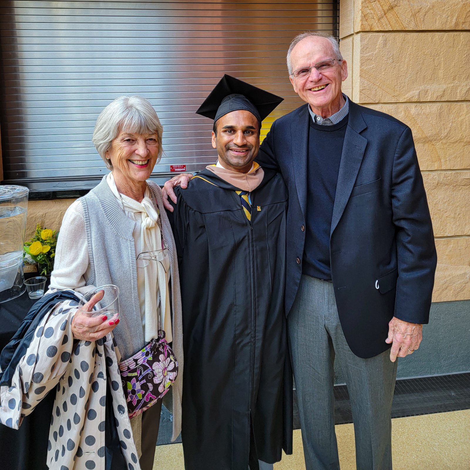 Chin Weerappuli with Jack and Jackie Harbaugh